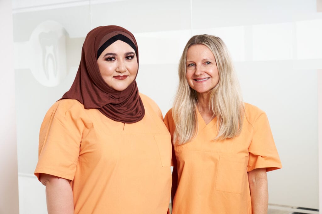 A lovely team of dentists in Munich Schwabing, working in a professional dental practice.